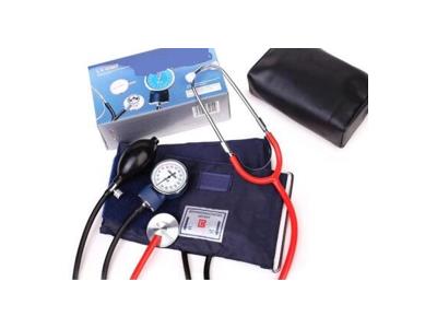 Manual blood pressure cuff + Stethoscope