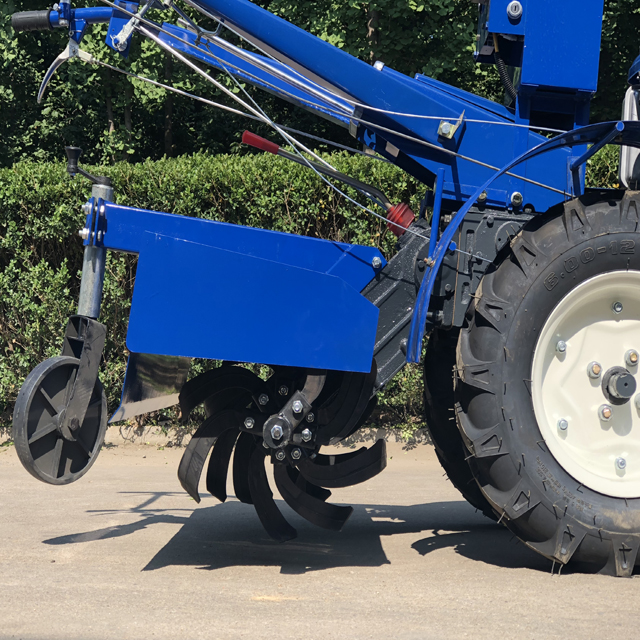 walking behind tractor