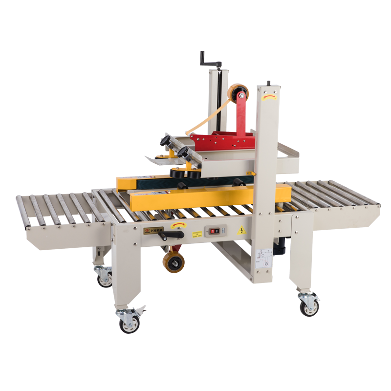 Left and right drive carton sealer