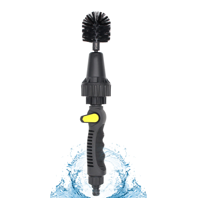 Water-powered flow -thru cleaning brush tire brush